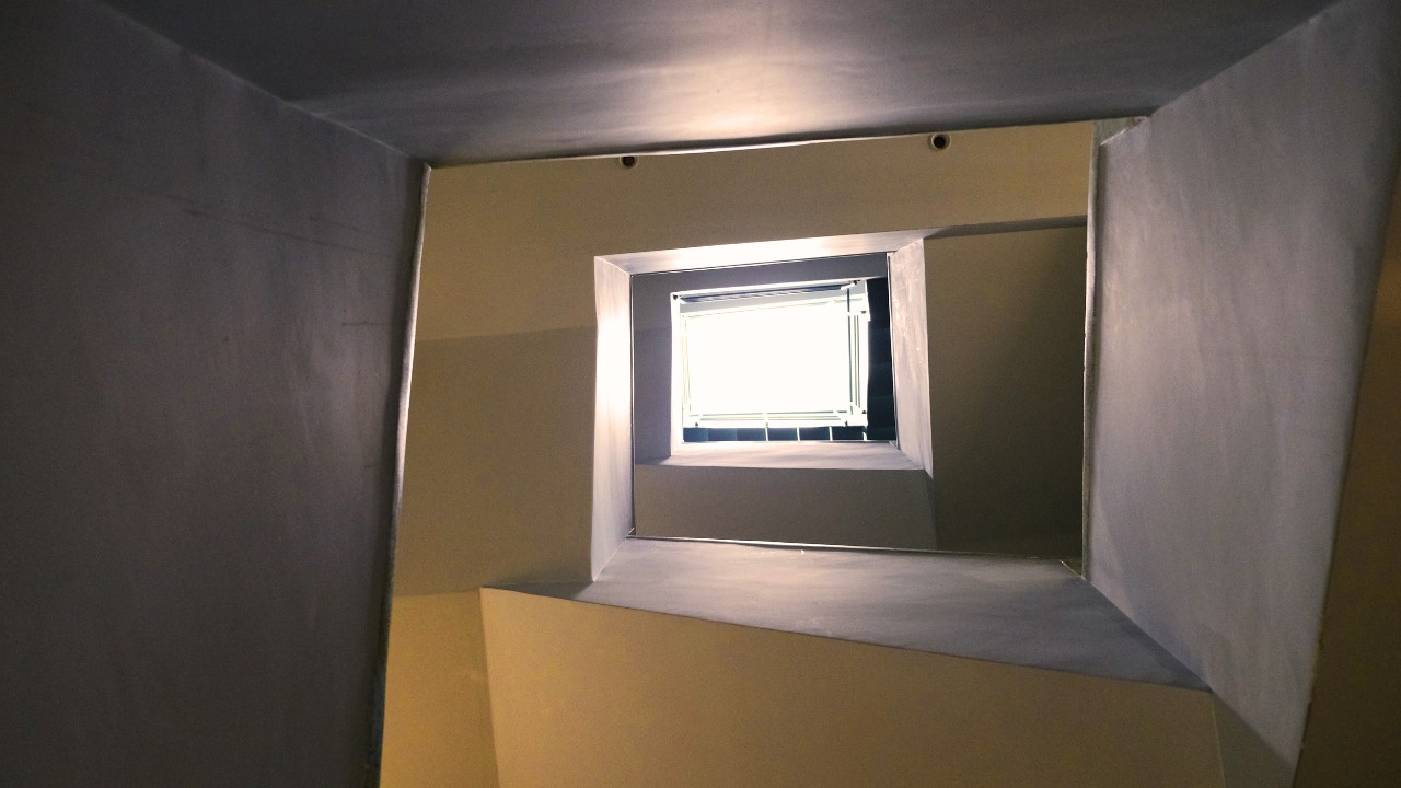 Staircase and skylight at FIT TOUR’s new office – filled with natural light, open air, and artistic energy